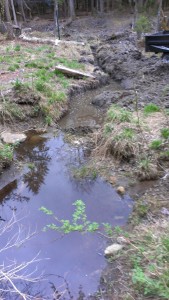 Long shot of pond and new creek to feed it